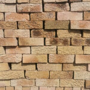 Argan Rustic Semi-Face Bricks from DezYNO Bricks – Durable, textured bricks perfect for walls and outdoor projects.