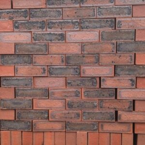Rusty Blend Satin Dark Face Brick supplied by DezYNO Bricks – High-quality, durable bricks for building and paving.