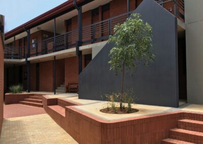 Completed building project featuring the Terracotta Travertine face bricks from DezYNO Bricks – Strong, aesthetic masonry for lasting construction.